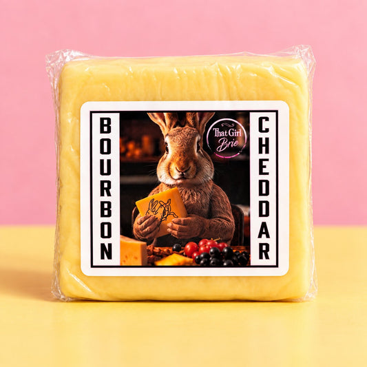 Bourbon Cheddar bourbon cheese in That Girl Brie packaging