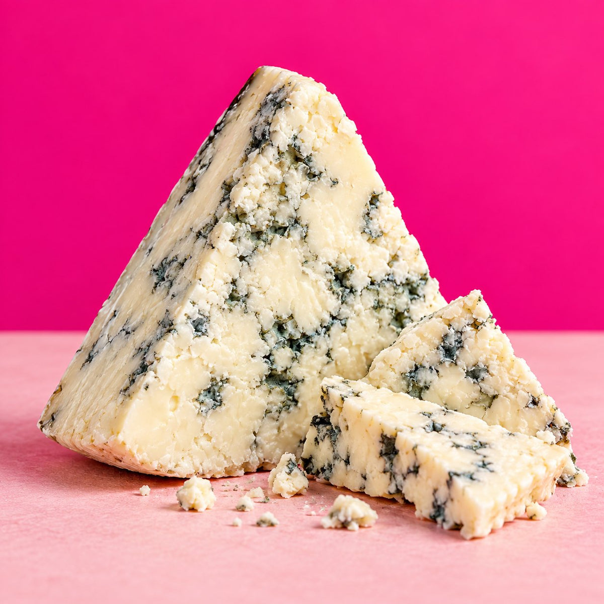 The Velvet Muse blue goat cheese cut into a wedge