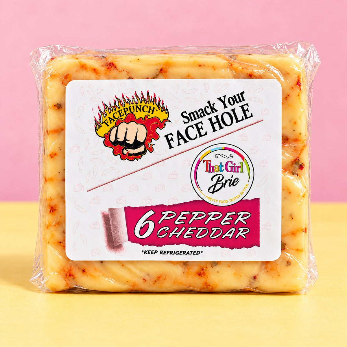 6 Pepper Cheddar hot pepper cheese in That Girl Brie packaging