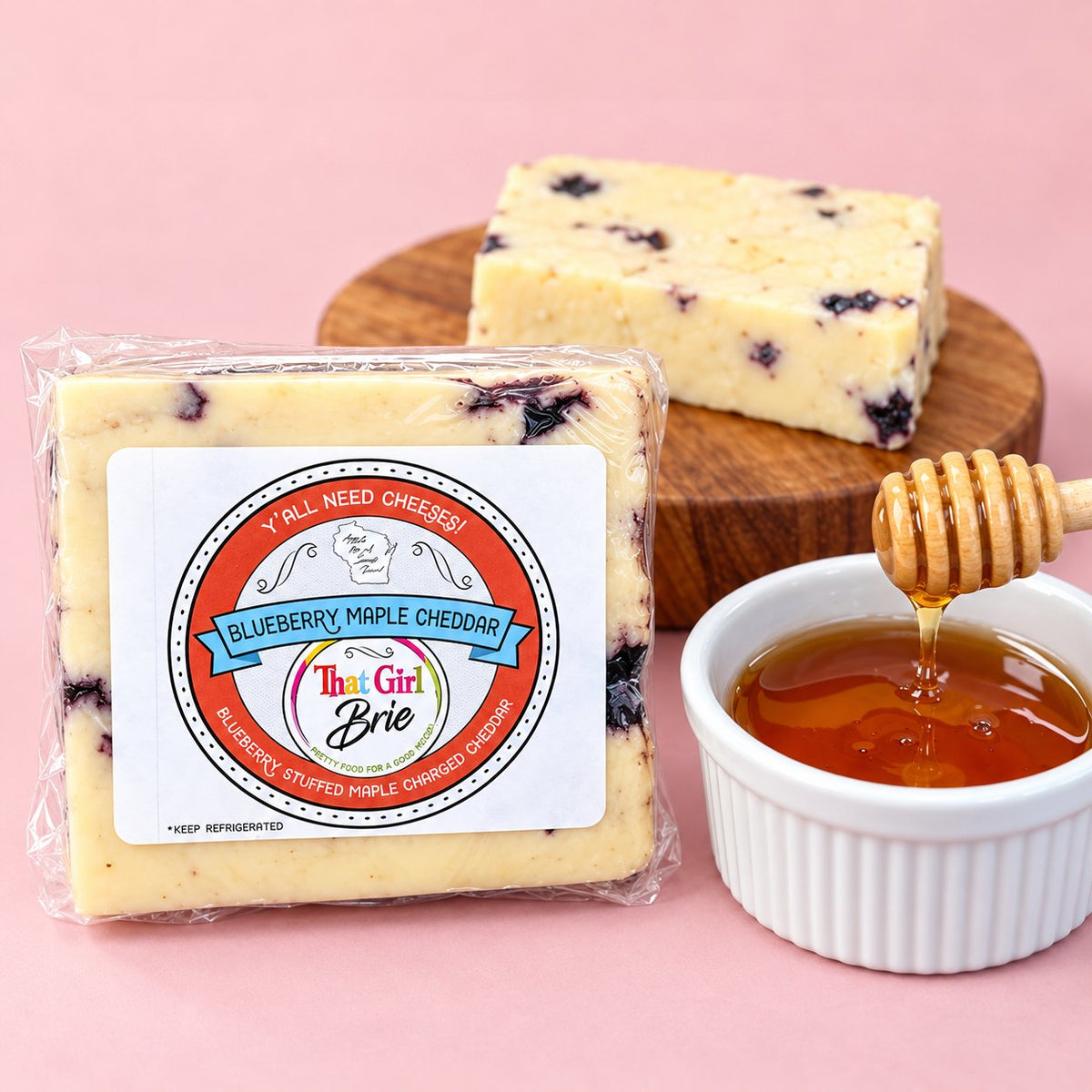Blueberry Maple Cheddar, a blueberry cheddar cheese block with honey