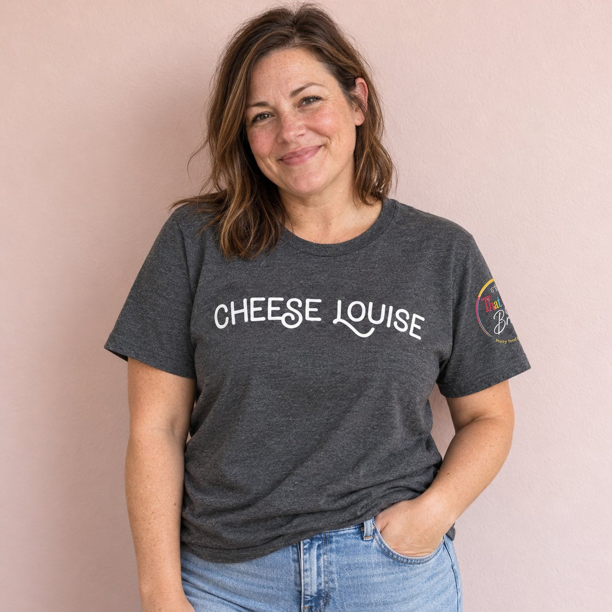 Woman wearing the Cheese Louise t-shirt from That Girl Brie