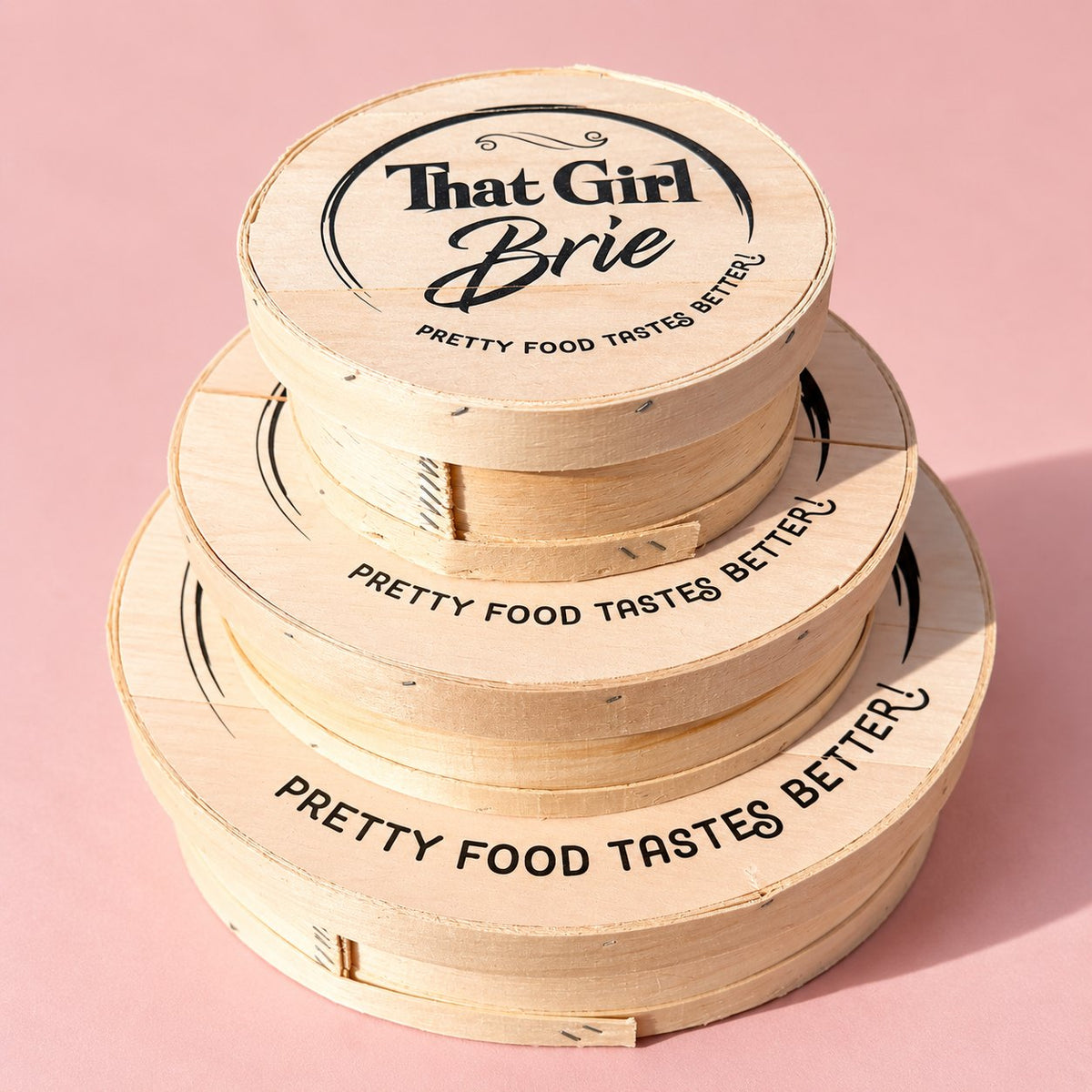 Keepsake wooden cheese boxes with That Girl Brie "Pretty food tastes better" lids