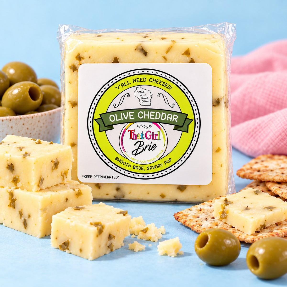 Olive Cheddar, cheddar with olives, served with green olives