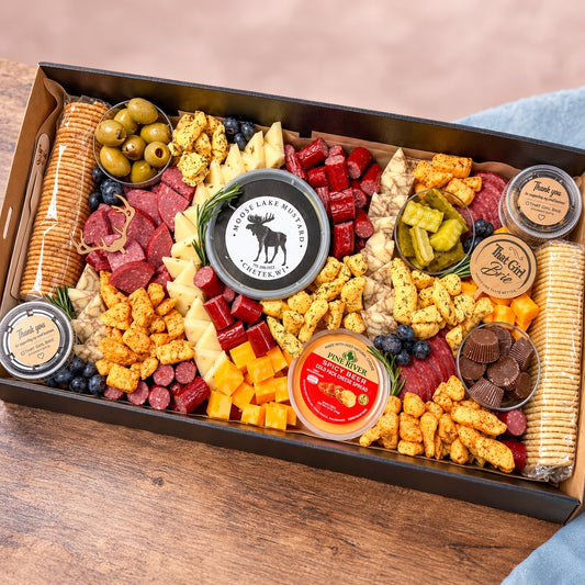 The Northwoods TGB Box with Moose Lake mustard, summer sausage, cheese curds and pickles