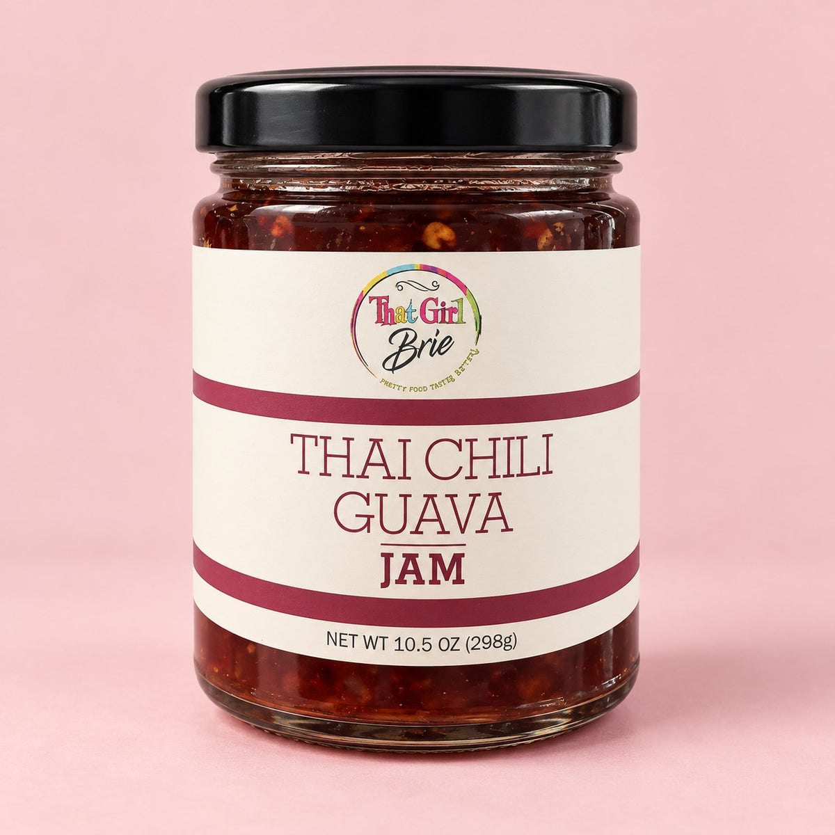Jar of Thai Chili Guava sweet Thai chili jam on a light pink background